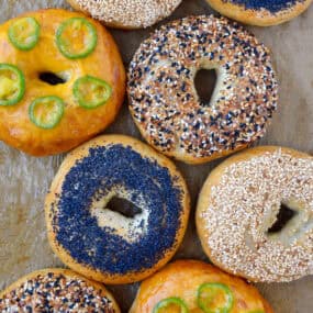Four varieties of homemade bagels, including poppyseed, everything, sesame seed and jalapeño cheddar.