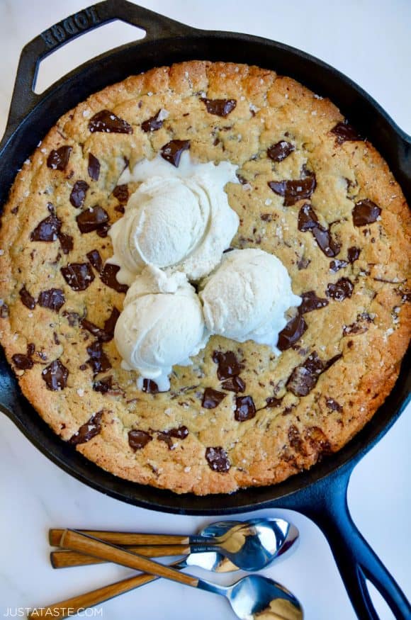 Top down view of The Ultimate Skillet Chocolate Chip Cookie topped with vanilla bean ice cream