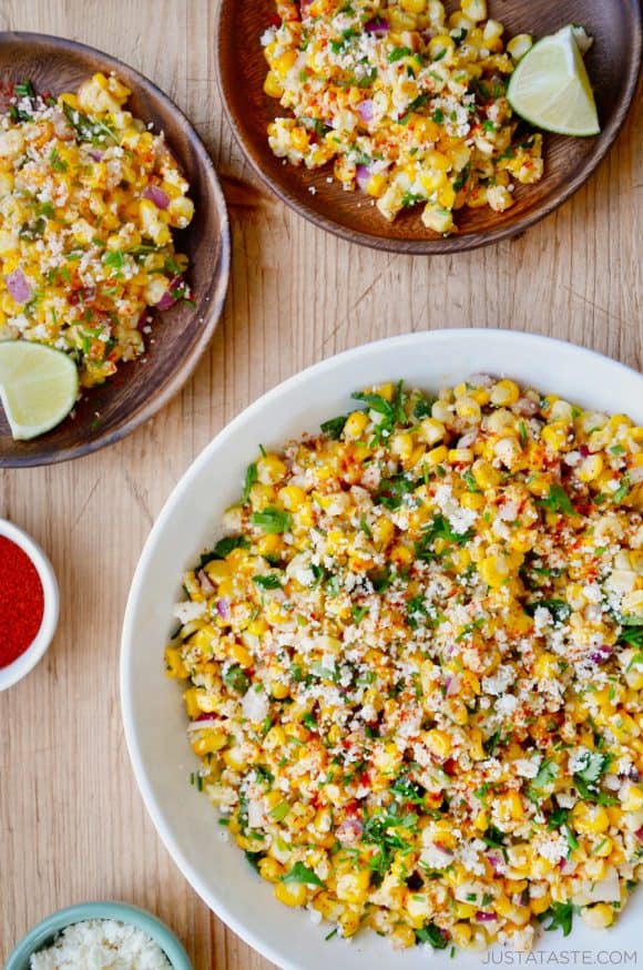 The best Elote Corn Salad topped with fresh herbs and Cotija cheese