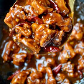 Large spoon containing Easy General Tso's Chicken.