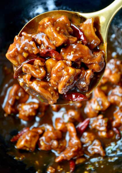Large spoon containing Easy General Tso's Chicken.