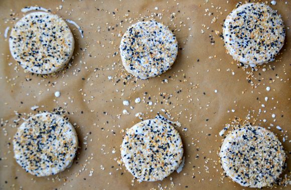 Biscuit rounds topped with everything seasoning