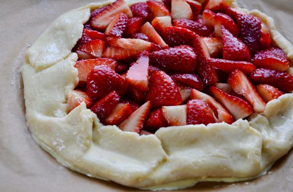 Dough filled with fresh, quartered strawberries