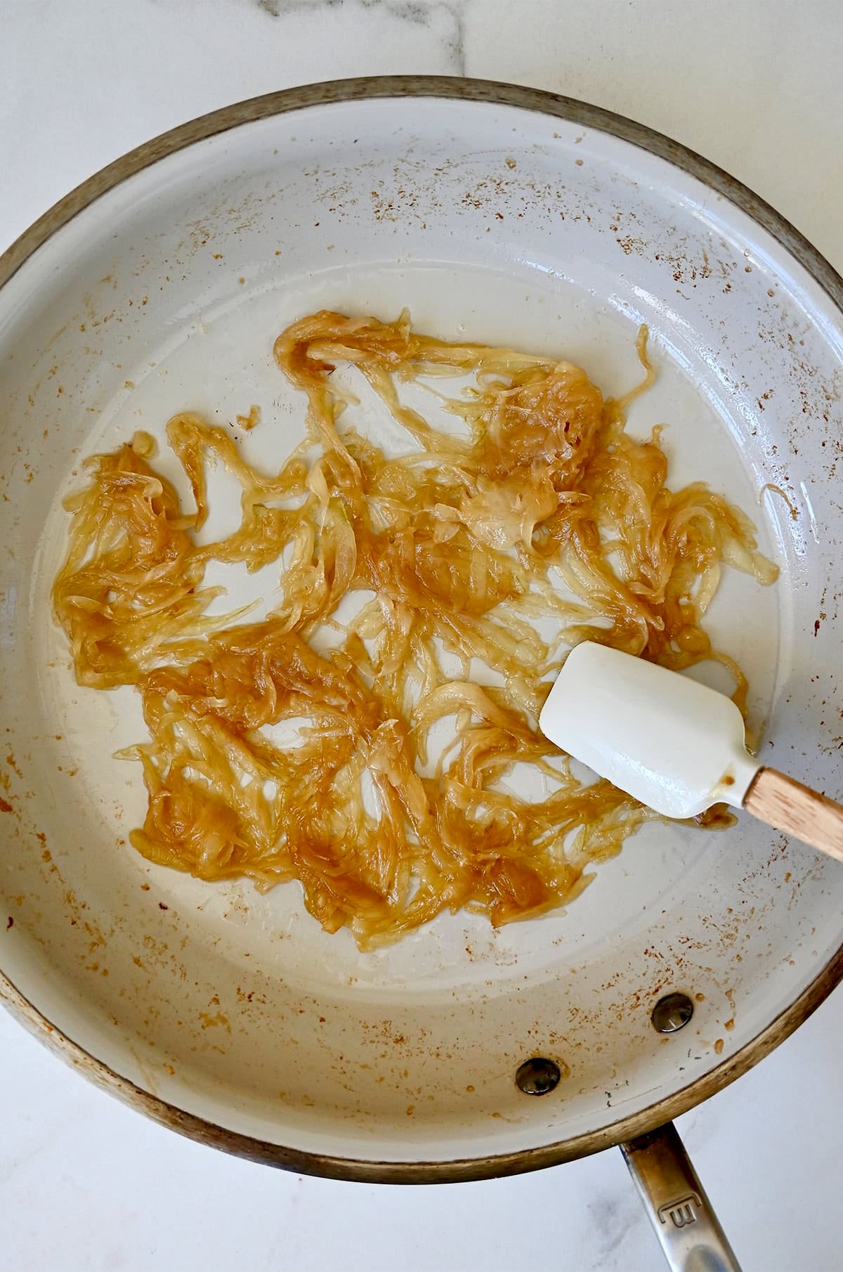 Caramelized onions in a skillet.