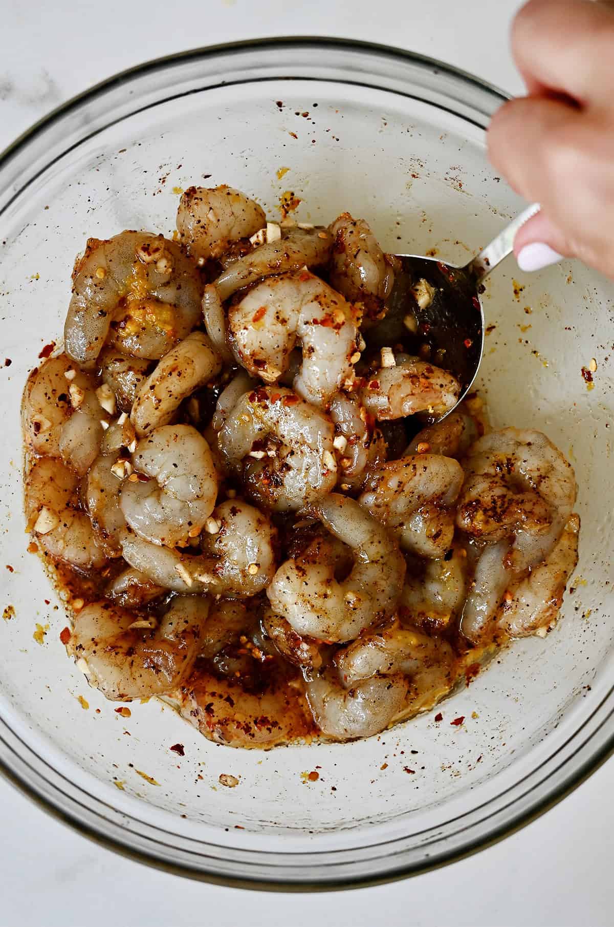 Marinated shrimp in a bowl.