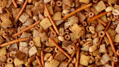 Closeup view of Homemade Chex Mix with pretzels and mixed nuts