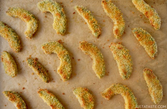 Crispy Baked Avocado Fries on brown parchment paper