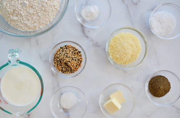 Small glass bowls containing the ingredients to make homemade bread