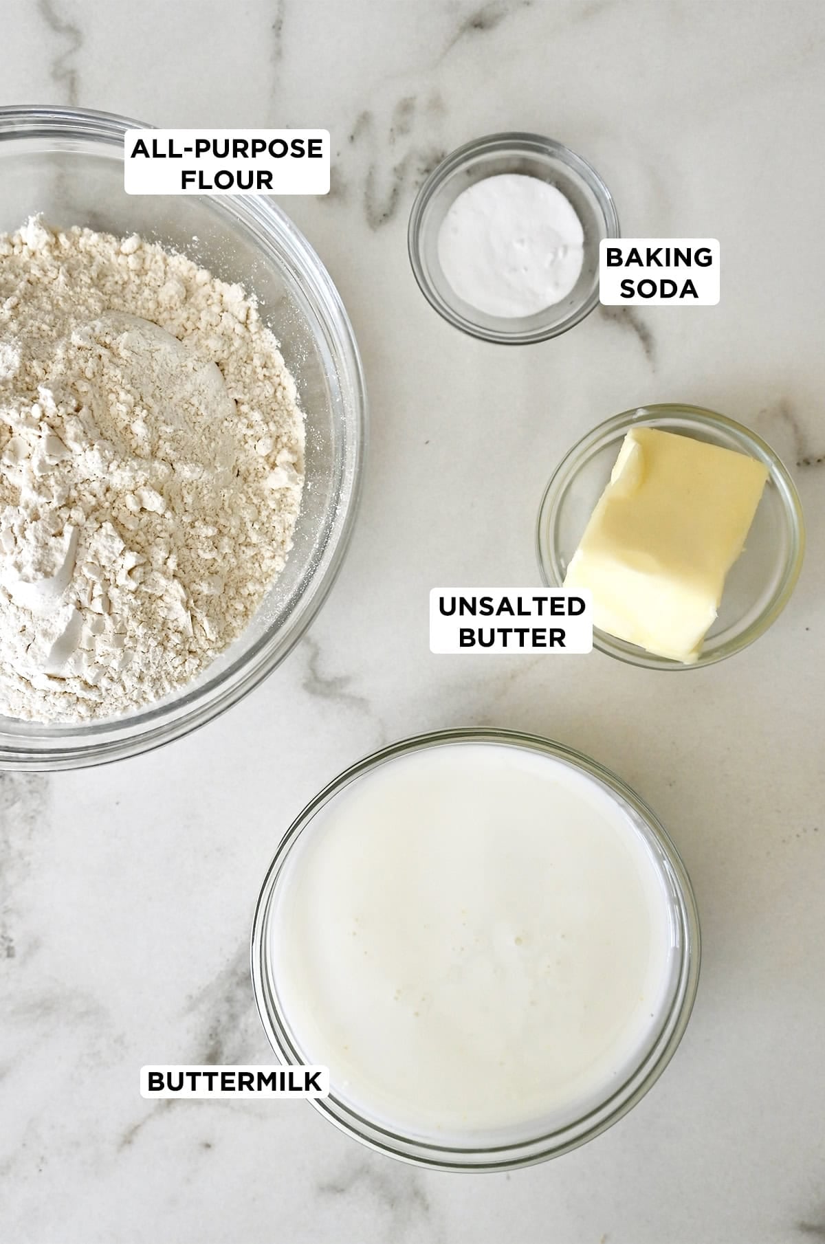 The five basic ingredients to make bread without yeast: flour, butter, baking soda, buttermilk and salt.