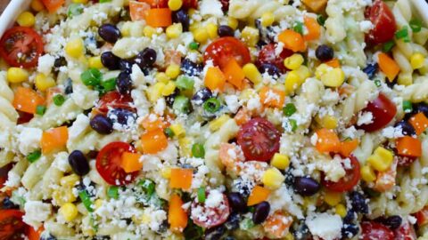 Large bowl containing Southwestern Pasta Salad with Avocado Dressing