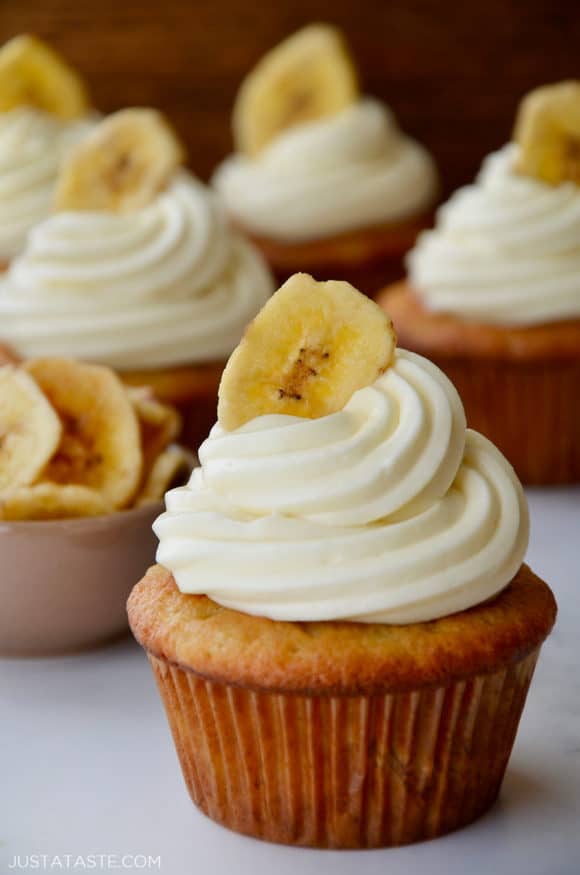 Banana Cupcakes with Cream Cheese Frosting topped with a banana chip