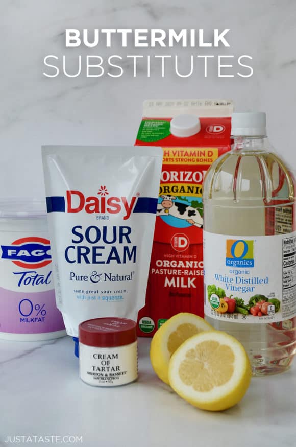 Containers of yogurt, sour cream,, milk and white vinegar as buttermilk substitutes