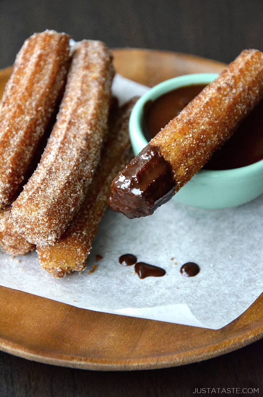 Easy Homemade Churros dipped in chocolate sauce.