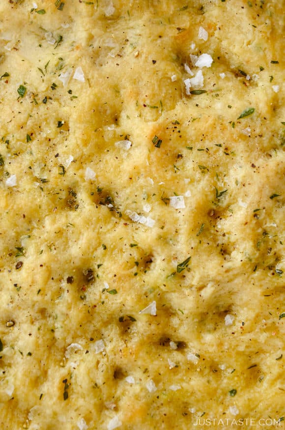 Closeup view of dimpled homemade focaccia bread without yeast