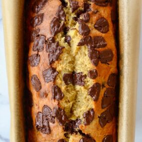 Olive Oil Banana Bread in parchment-lined bread pan