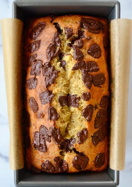 Olive Oil Banana Bread in parchment-lined bread pan