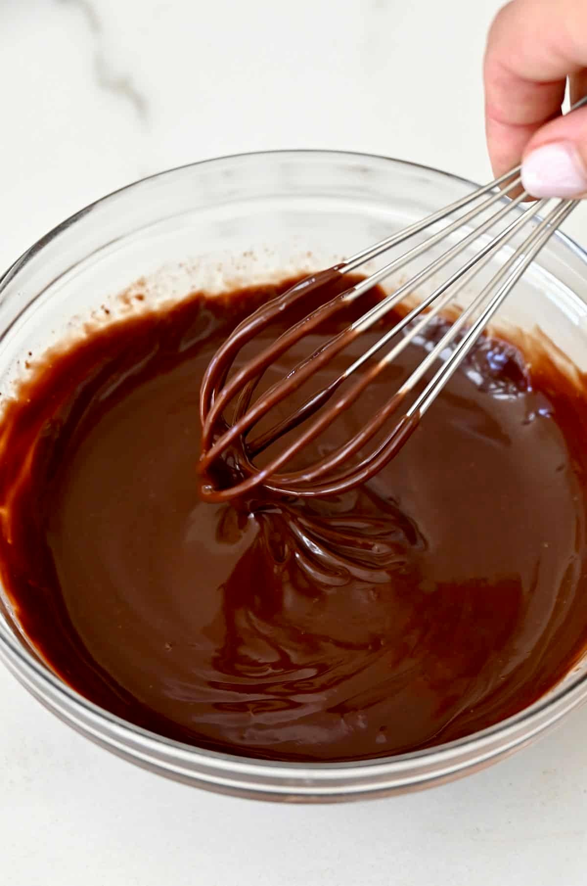Chocolate sauce for churros in a bowl.