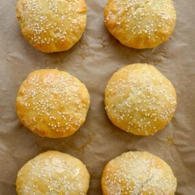 Six Quick Homemade Burger Buns Without Yeast on parchment paper-lined baking sheet