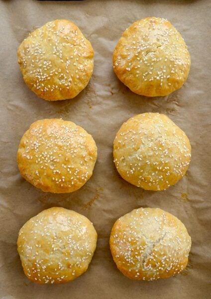 Six Quick Homemade Burger Buns Without Yeast on parchment paper-lined baking sheet