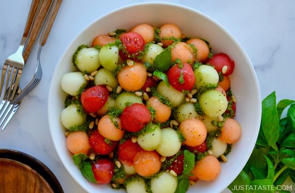 Fresh melon ball salad with pine nuts and basil vinaigrette