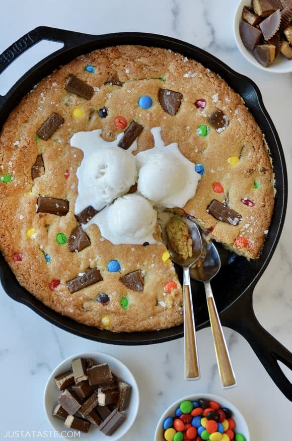 The best leftover Halloween Candy Skillet Cookie in a cast iron skillet 