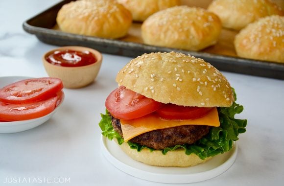 A no yeast burger bun with grilled hamburger, lettuce, tomato and cheese