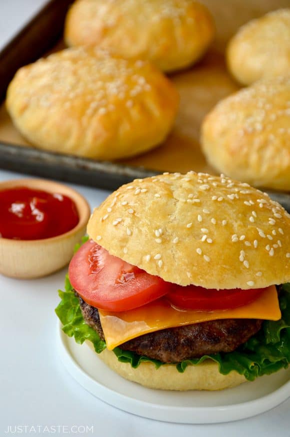 Easy no yeast burger buns with grilled hamburger, lettuce, cheese and tomato