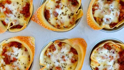 Muffin Tin Lasagna Cups topped with mozzarella cheese