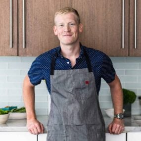 Justin Chapple standing in a kitchen