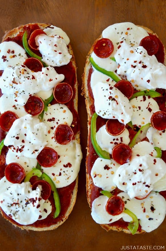 Top down view of easy French bread pizza topped with burrata and crushed red pepper flakes