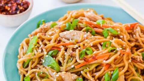 Quick Chicken Chow Mein in blue serving bowl with chopsticks
