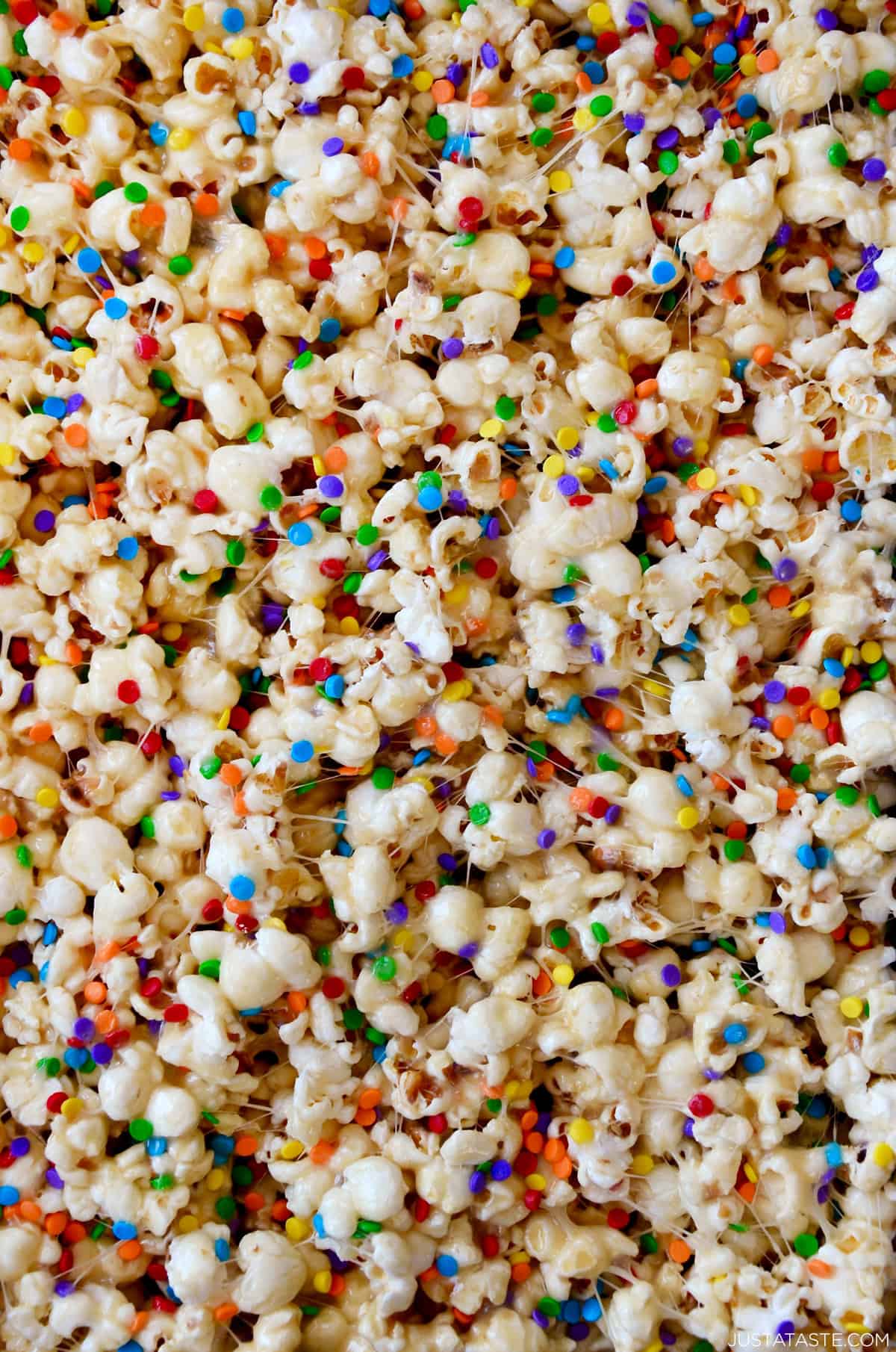 Marshmallow popcorn with rainbow sprinkles.