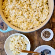 A top down view of stockpot and bowl with 30-Minute White Cheddar Mac and Cheese.