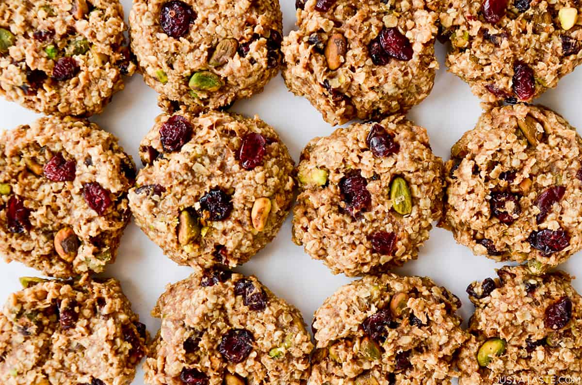 Three rows of healthy breakfast cookies studded with dried cranberries and pistachios.
