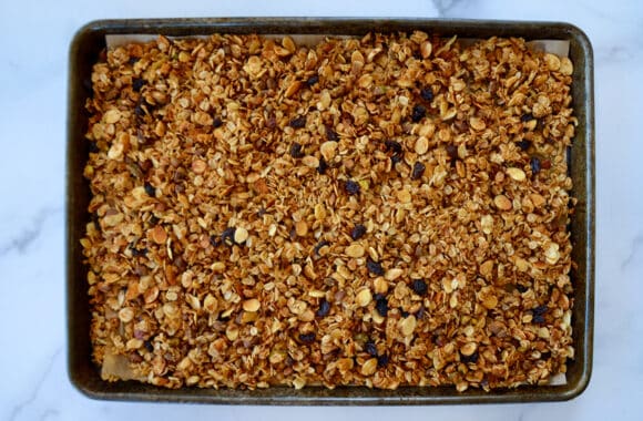 A baking sheet containing honey granola