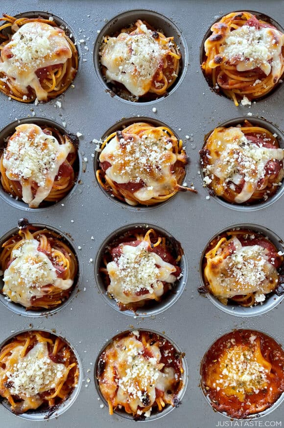 A top-down view of spaghetti cupcakes in a muffin pan