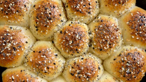 Top-down view of Everything Bagel Pull-Apart Bread with Cream Cheese in cast iron skillet