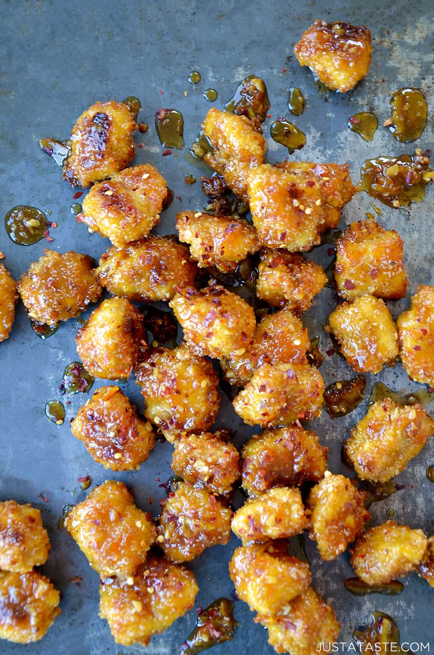 Baked Orange Chicken Poppers on a baking sheet