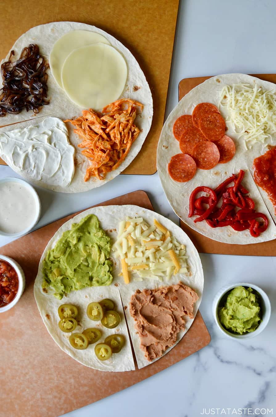 Open-faced nacho-inspired tortilla, buffalo chicken tortilla and pizza-style tortilla
