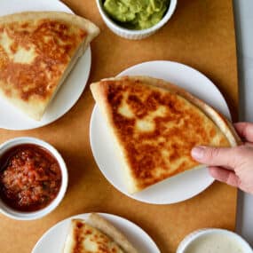 Top-down view of three folded tortillas using the TikTok tortilla wrap hack method