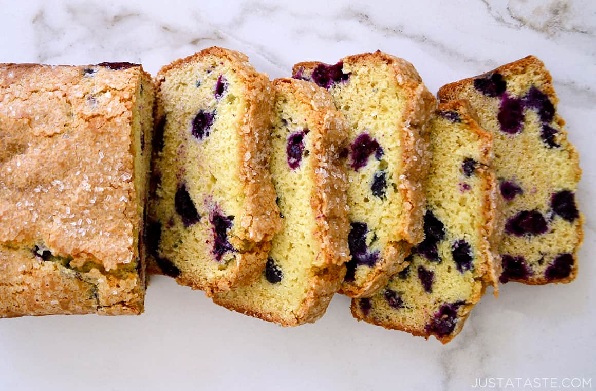 A top-down view of slices of Blueberry Orange Juice Bread