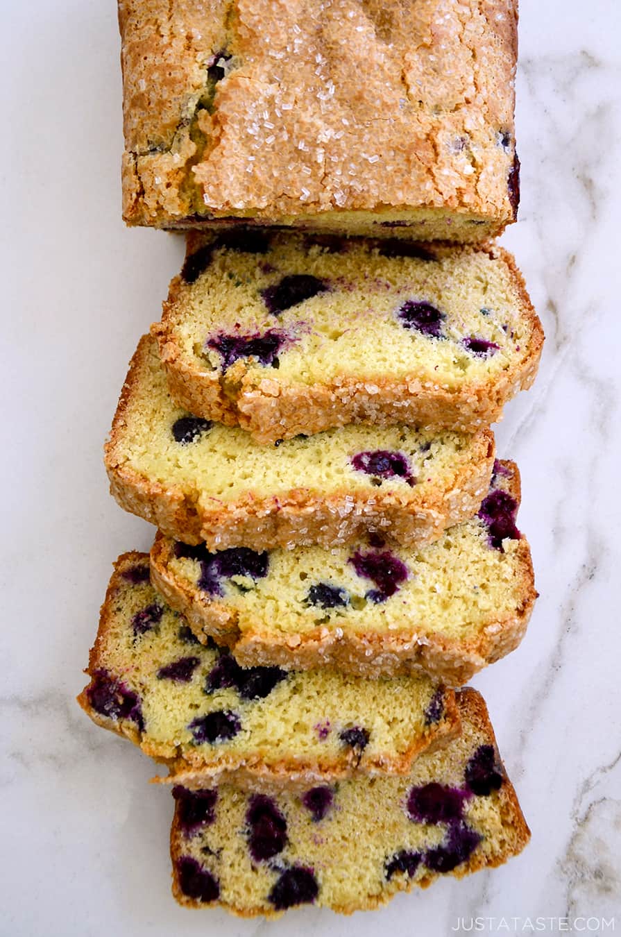 A top-down view of slices of Blueberry Orange Juice Bread