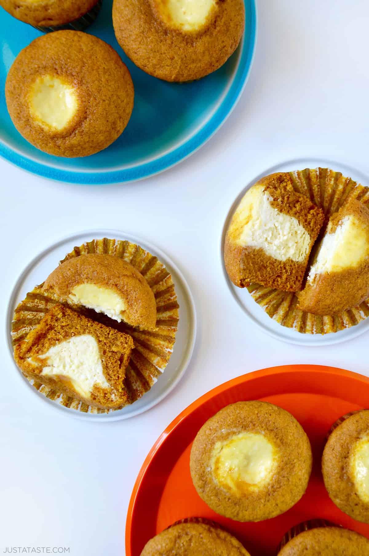 Pumpkin muffins with a thick cream cheese center.