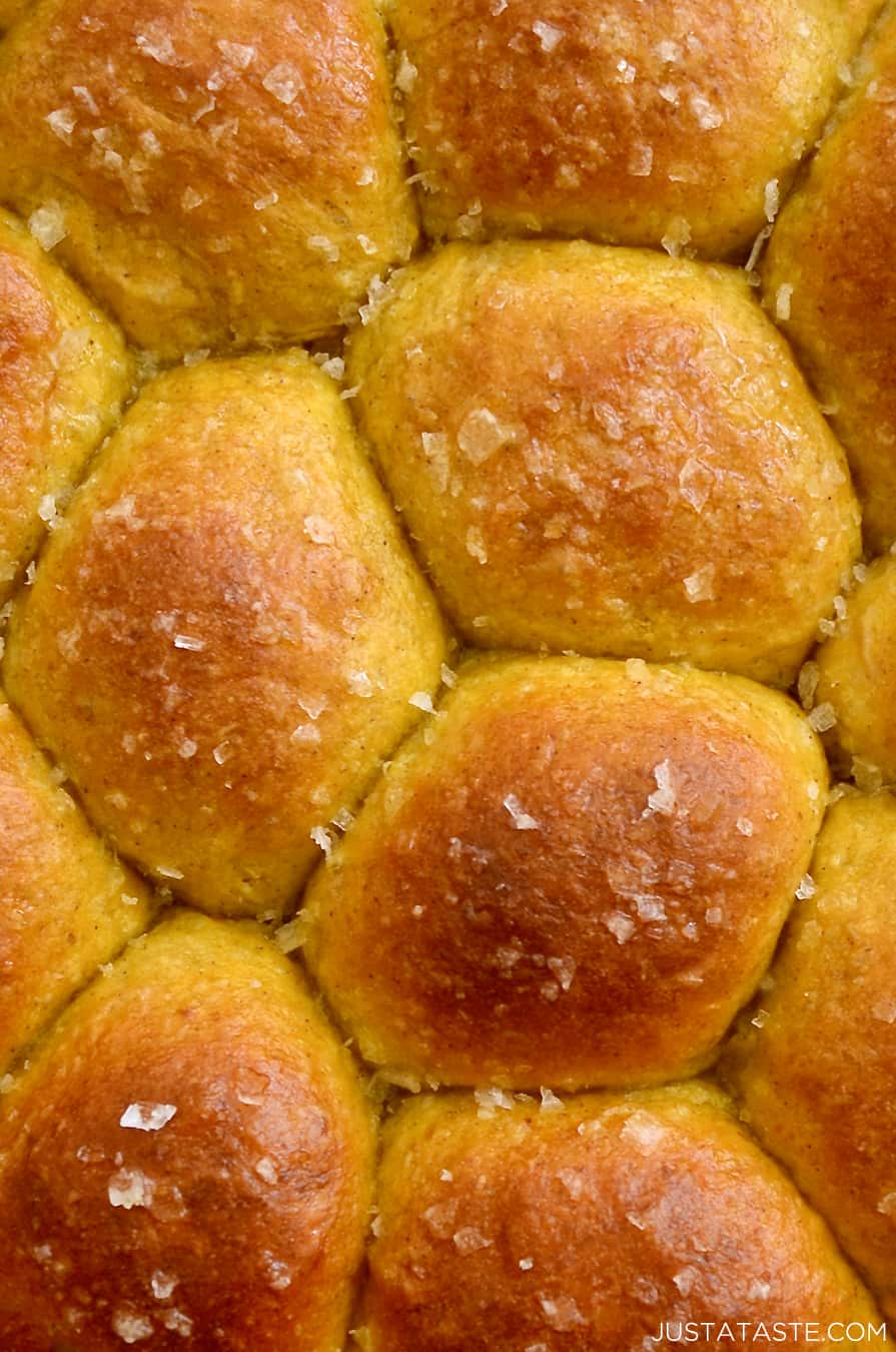 A close up of dinner rolls topped with sea salt