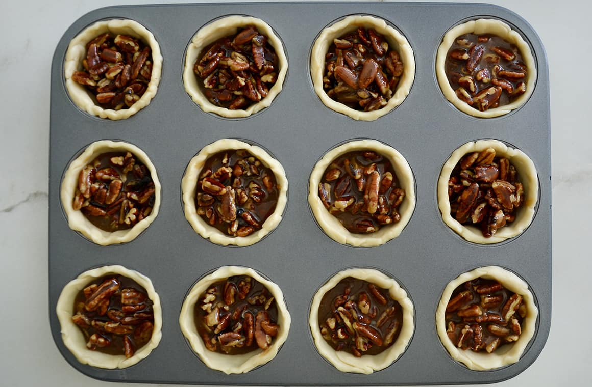Unbaked mini pies in baking dish