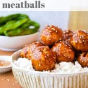 Baked Teriyaki Chicken Meatballs over white rice in a large bowl with text overlay that reads, "baked teriyaki chicken meatballs."