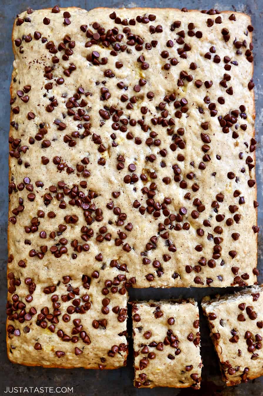 A top-down view of banana bars topped with chocolate chips