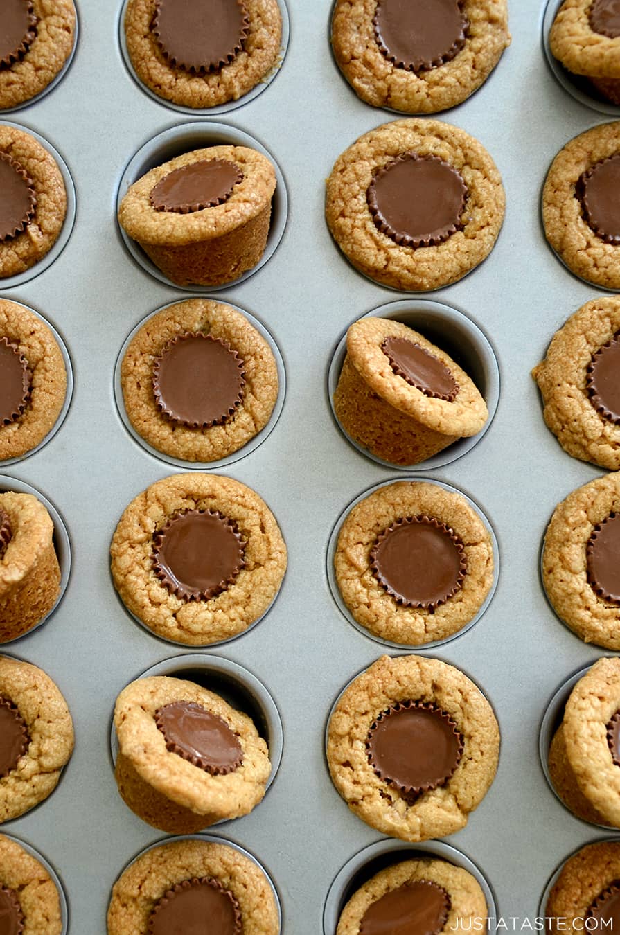 A top-down view of Mini Peanut Butter Cup Cookies in a muffin tin