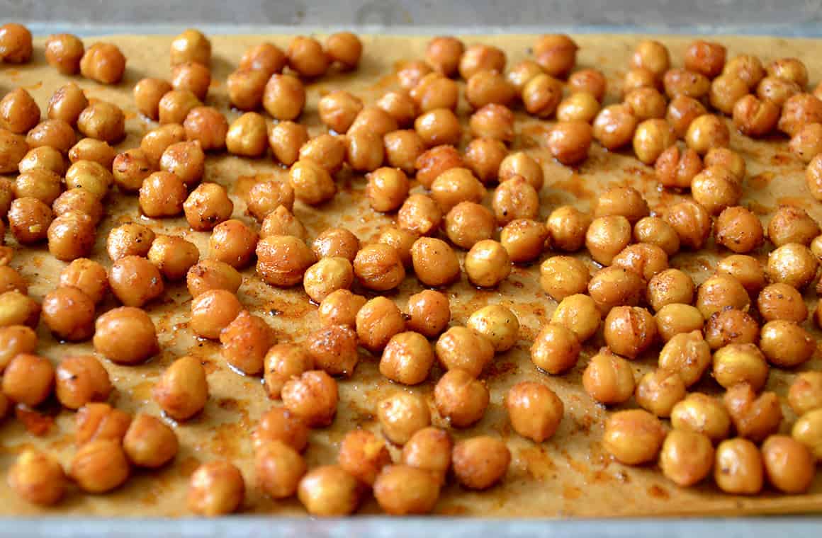 A baking sheet containing roasted chickpeas