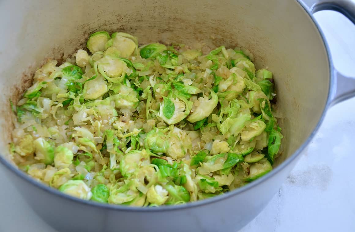Sautéed Brussels sprouts in a large stockpot 